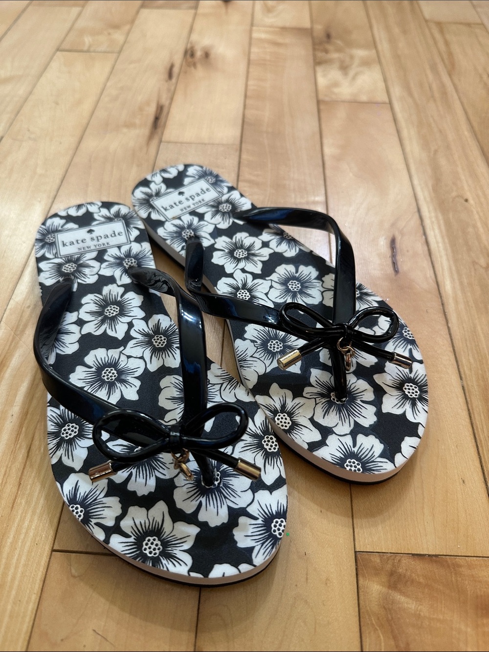 kate spade Black & White Floral Bow Flip Flops